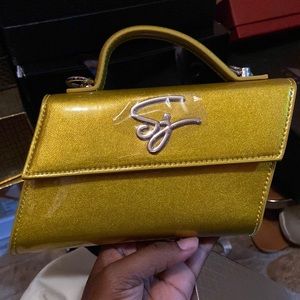 New in box Shane Justin purse